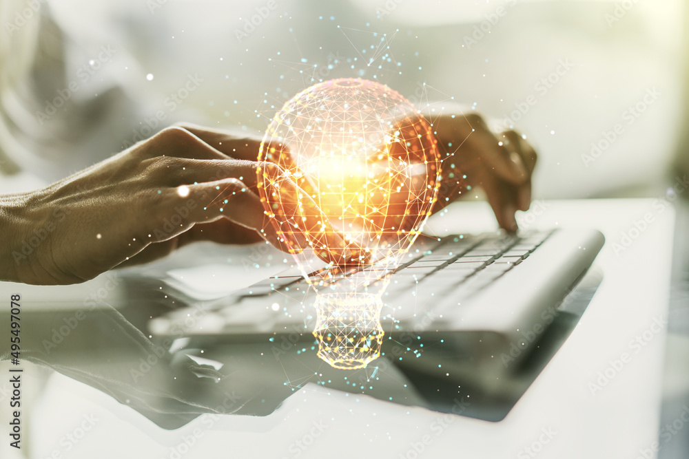 Poster creative light bulb hologram with hands typing on computer keyboard on background, idea concept. mul