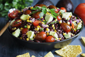 Homemade Mexican black bean and corn salad or Texas caviar bean dip lime dressing, Served with...