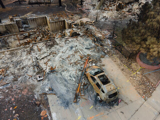 remnants of a burned home and car from a destructive urban wildfire Marshall Fire due to Climate Change