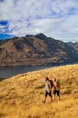 Young male and female New Zealand adventure hikers