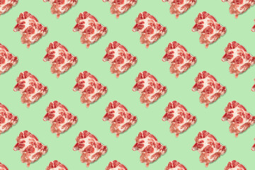 Seamless food pattern with raw pork meat slices on green background, beef steaks. top view. Food flatly flat lay