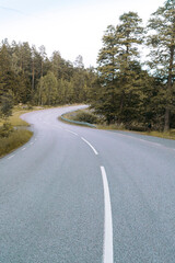 Empty winding country road © Image Source RF