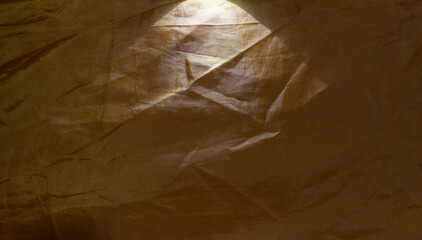 Pattern background on gray-brown wall with light and shadows