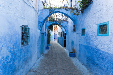 Morocco, Chefchaouen, Narrow alley and traditional blue houses