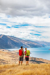 Fototapeta premium Adventure couple New Zealand outdoor hiking Lake Wakatipu