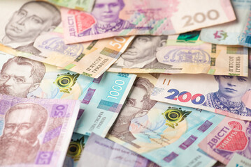 Obraz na płótnie Canvas Photo of ukrainian currency a lot of hryvnia banknotes