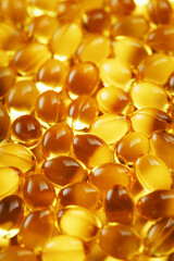 Background of capsules in a shell with vitamin Omega 3 Fish oil