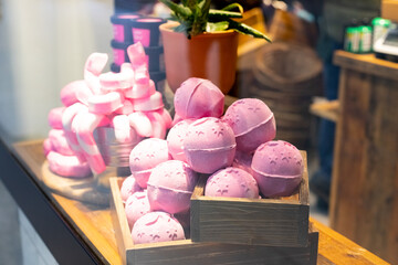 Bath Bombs - Water-effervescent balls that contain cosmetic body care oils and relax flavors, spa treatments at home. Cosmetic present for women. Spa, wellness and bath products store.