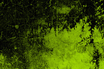 Abstract green painted abandoned concrete wall with dark grunge texture and cracks