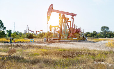 Fototapeta na wymiar The oilfield with pump units