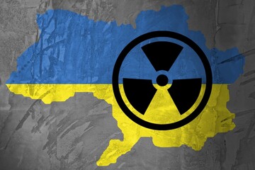 Concept of the atomic energy Policy of world concept. A flag Ukraine and a radiation hazard sign