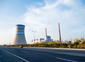 Coal power factory with chimney and cooling towers
