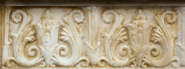 Fototapeta na wymiar The stone bas-relief with interesting pattern