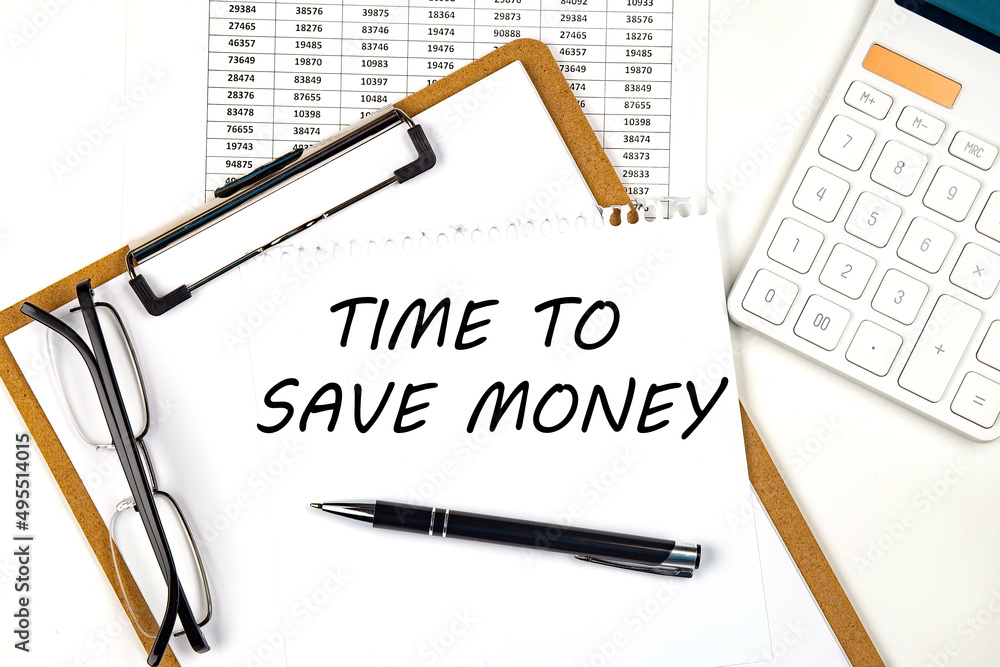 Poster text time to save money on the white paper on clipboard with chart and calculator
