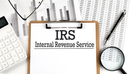 Paper with IRS a table on charts, business concept