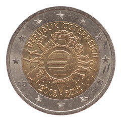 Austria - circa 2012: a 2 Euro coin of Austria showing the Euro symbol on globe with buildings 10...