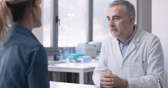 a primary care physician receives a patient in his office