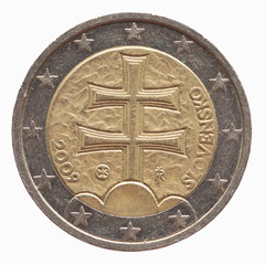 Obraz na płótnie Canvas Slovakia - circa 2009: a 2 Euro coin of Slovakia with a double cross on three mountains