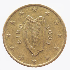 Ireland - circa 2002 : a 50 cent coin of Ireland with the Irish harp musical instrument