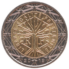 France - circa 2019  : a 2 Euro coin of France with  a tree with text: Liberty, equality, fraternity,
