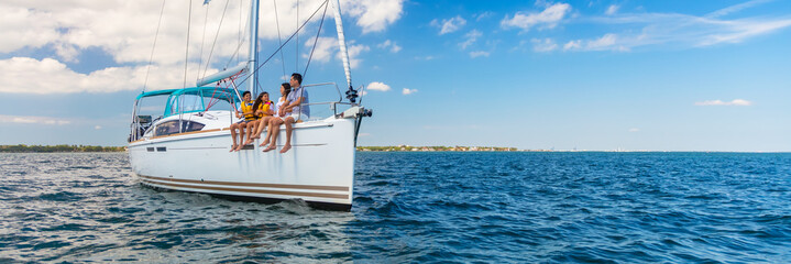 Panoramic Latin American family sailing yacht on luxury vacation