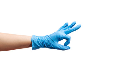 Doctor showing OK gesture while wearing latex gloves