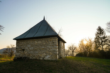little shelter hut surrounded by trees before sunset in germany near stuttgart