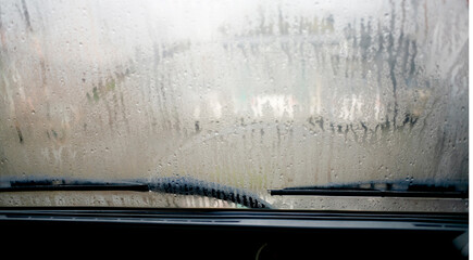 close-up view of sweaty car with dew all over windshield - obrazy, fototapety, plakaty