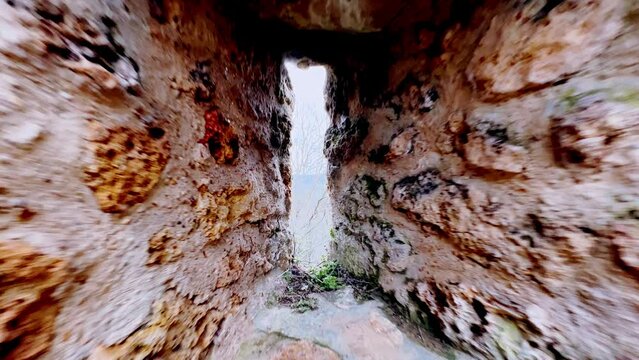 Close up loophole of old French castle fortification