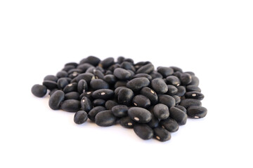 Black beans isolated on white background. Source of protein and fibre. Used in Mexican cuisine. 