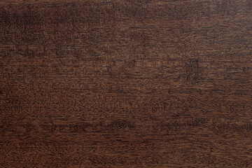 Empty wooden surface is dark brown in color. Natural wood texture. Abstract background.