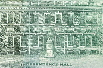 Independence Hall is super close-up on a hundred US dollars banknote of a new sample.