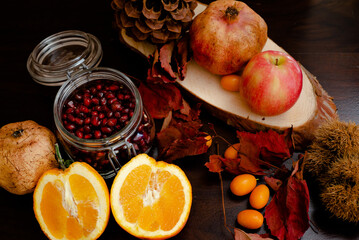 Fruit composition of pomme grenade, orange apple  and kumquat 