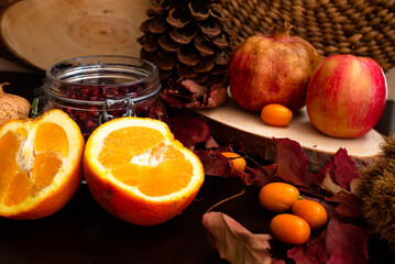 Fruit composition of pomme grenade apple, orange ,and kumquat 