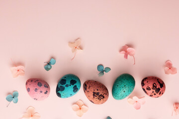Easter greeting card, border of pink and blue eggs and hydrangea flowers.