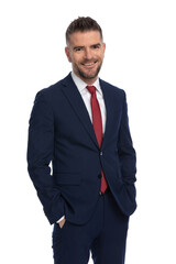 young handsome man feeling relaxed while posing