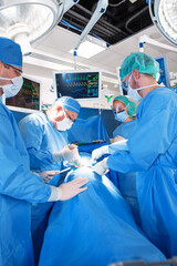 Surgical procedure on patient in medical training hospital