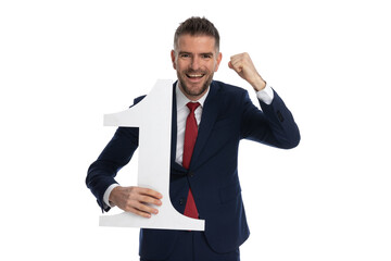 businessman celebrating the fact that he's number one