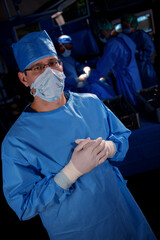 Portrait of frontline doctor in hospital operating theatre