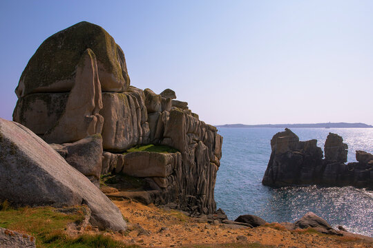 Natural sculpture: a weathered granite rock formation on Outer Head, Peninnis Head, St. Mary's, Isles of Scilly: Gugh and St. Agnes in the distance across St. Mary's Sound