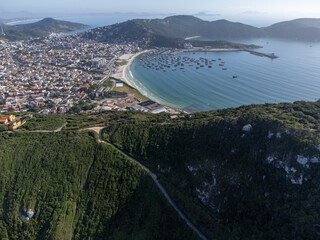 Arraial do Cabo, Rio de Janeiro, Brazil - red sunrise of wonderful paradise beach with white sands and turquoise water