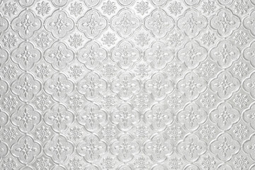 Textured pale white shiny light background with a pattern, painted glass in vintage style wall...