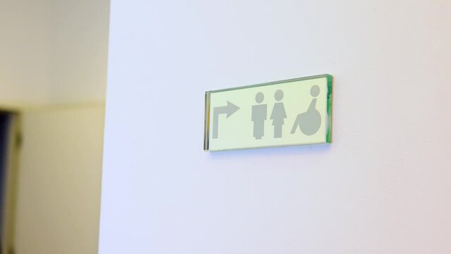 sign toilet for women men and disabled