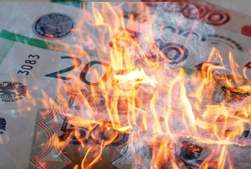 Background of russian rubles with fire flames