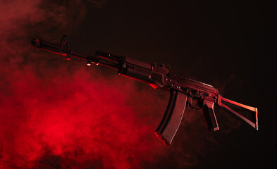 kalashnikov assault rifle in smoke
