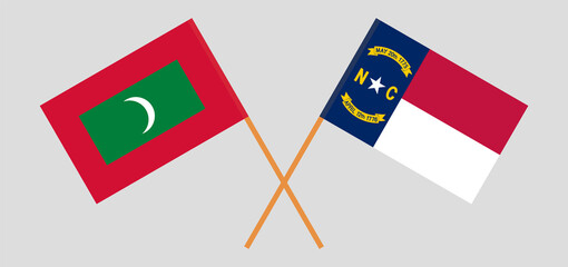 Crossed flags of Maldives and The State of North Carolina. Official colors. Correct proportion