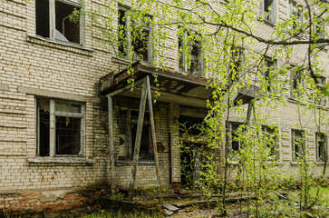 Abandoned white brick multistorey houses. Forgotten, abandoned ghost town Skrunda, Latvia. Former...