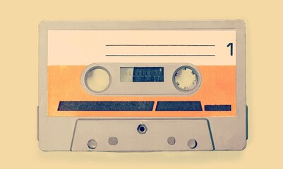 Retro vintage audio compact cassette in a plastic storage box