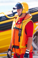 Sea rescue. A sea rescue worker and his speedboat.