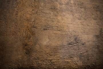 A dark textured wooden background